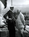 Kong Haakon og William Henry Singer ved vegopninga i 1936.
