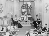 Frå gudstenesta i Holmedal kyrkje i samband med 100-års jubileet i 1968. Biskop Per Juvkam leia gudstenesta. Det var seks prestar til stades på jubileet, og kyrkja var fullsett.
