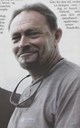 Christopher Blakey, leiar av ekspedisjonen i 1984. I 2004 var han på Gallen og stelte om minneplata han hadde vore med og sett opp i 1984.


