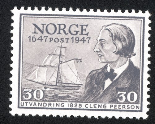 Bilete av eit frimerke som illustrerer utvandring.
